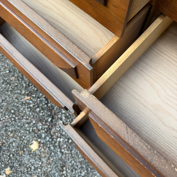 Vintage Mid-Century Modern Walnut Nine-Drawer Lowboy Dresser with Sculpted Wood Pulls