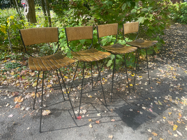 Four vintage bar stools